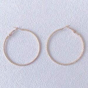 Gold engraved hoop earrings